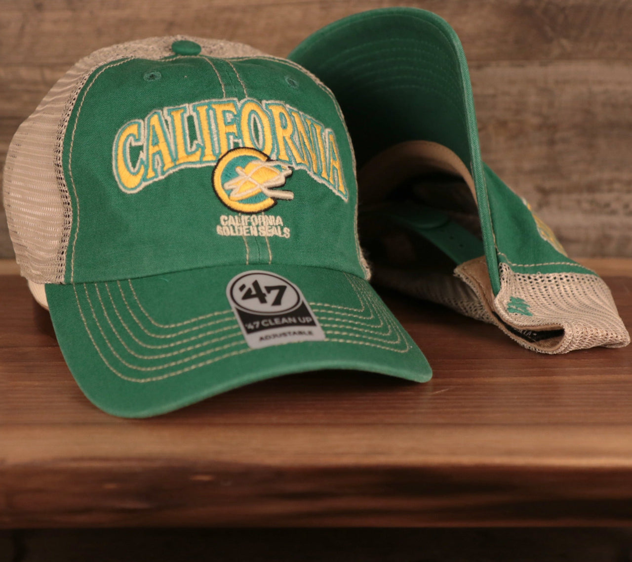 front and bottom of the California Golden Seals Green and Yellow Retro Adjustable Trucker Dad Hat