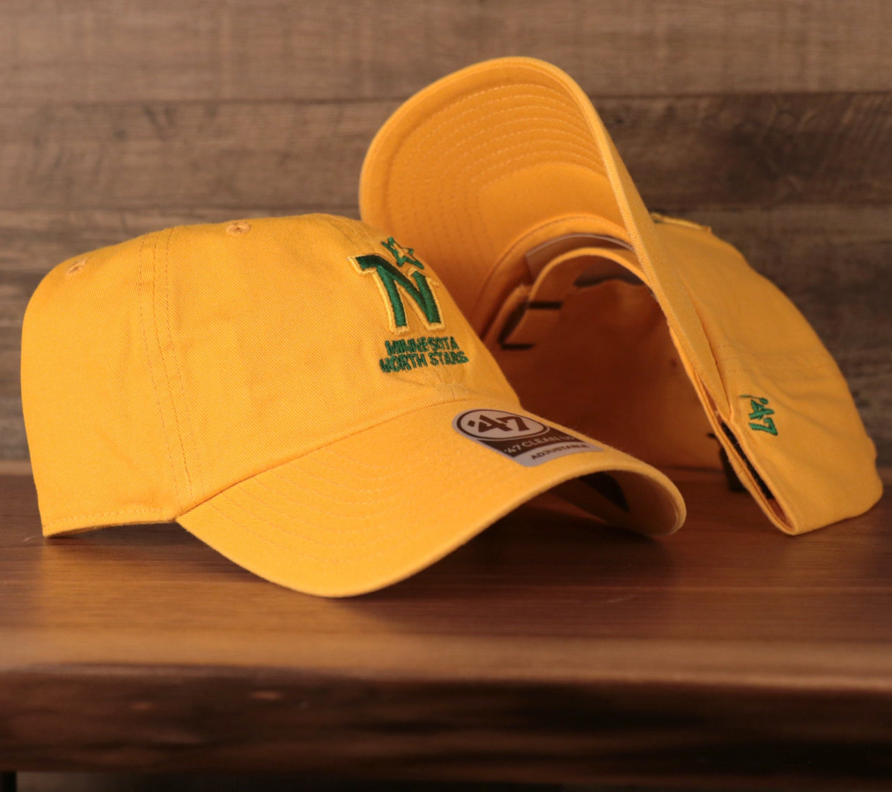 front and underside of the Minnesota North Stars Yellow Adjustable Retro Dad Hat