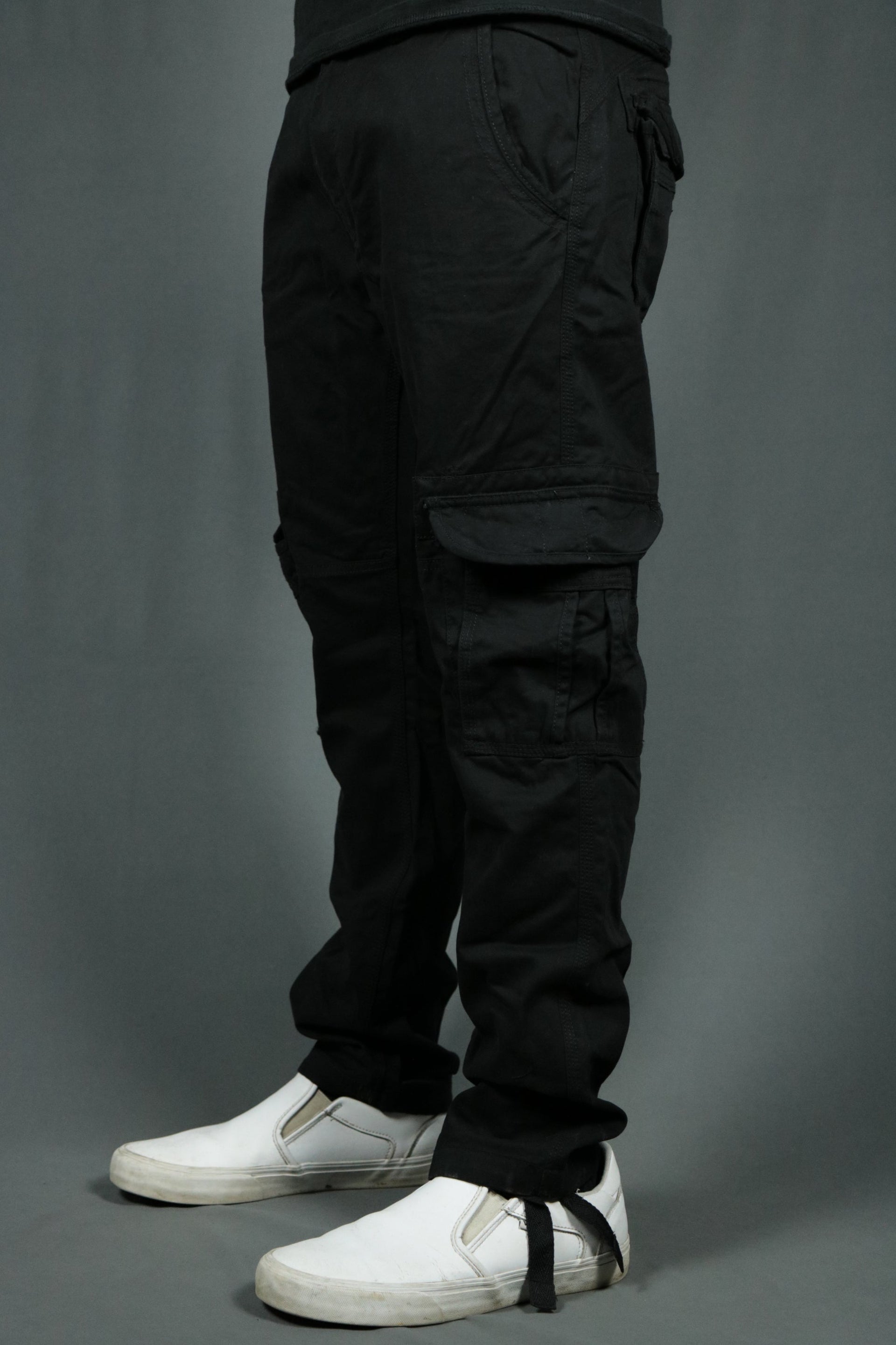 The tapered leg black 6 pocket utility cargo pants for men by Jordan Craig.