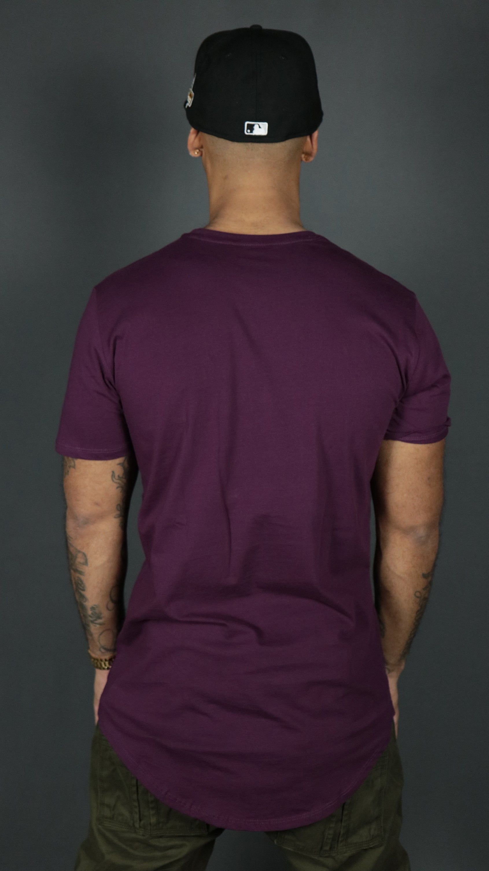 The back of the plum longline drop cut t shirt by Jordan Craig.