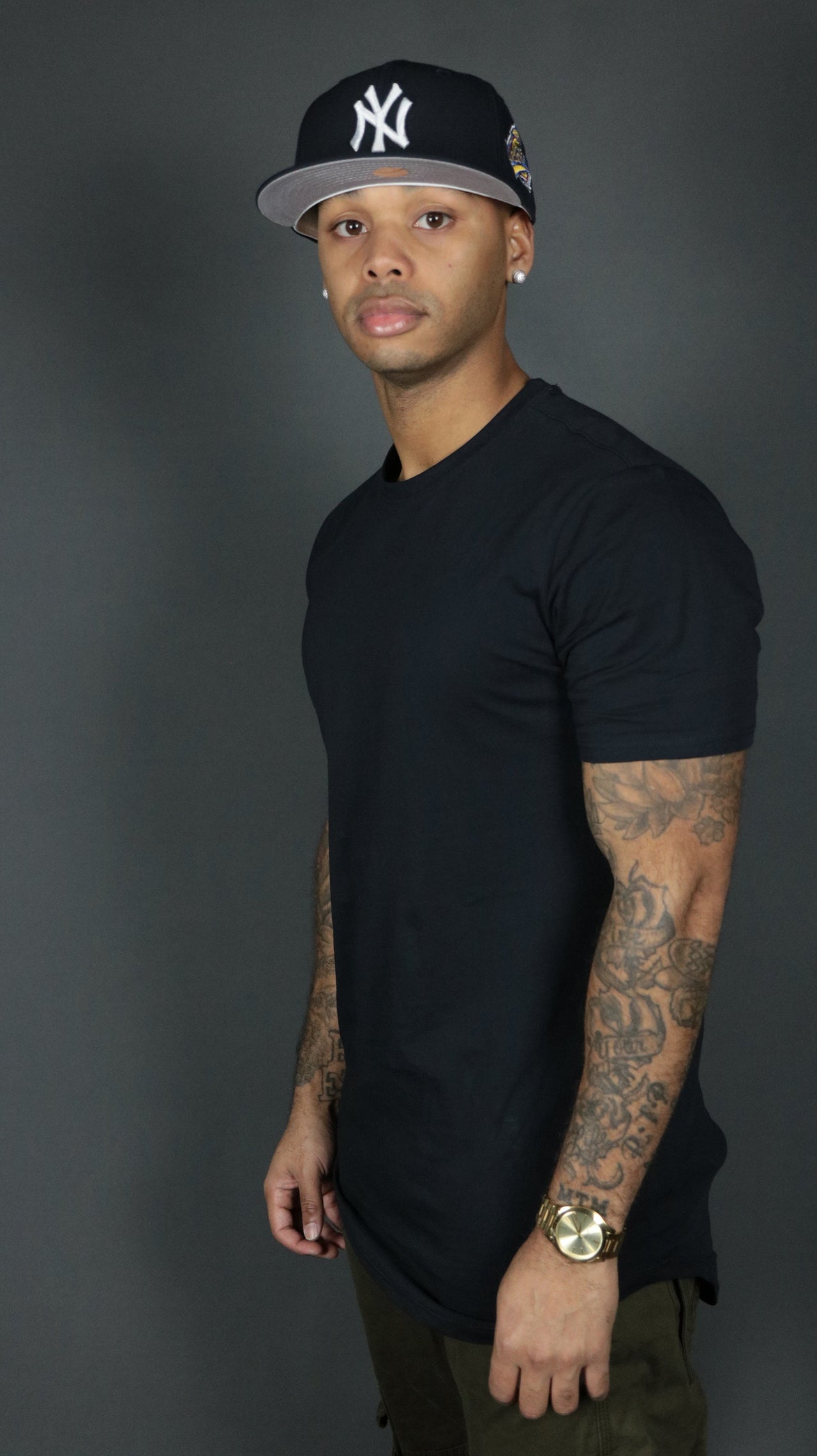 The navy Jordan Craig elongated shirt with hem drop cut design.