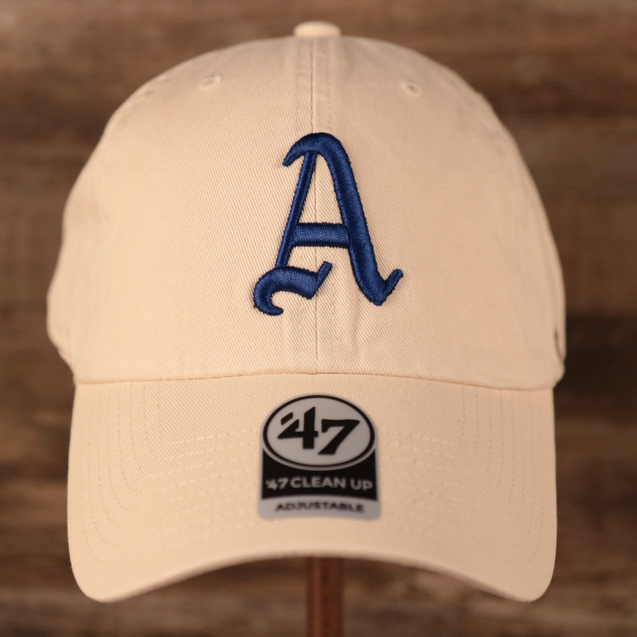 Philadelphia Athletics Royal Blue Logo Retro Cream Dad Hat Up close front logo of the cap