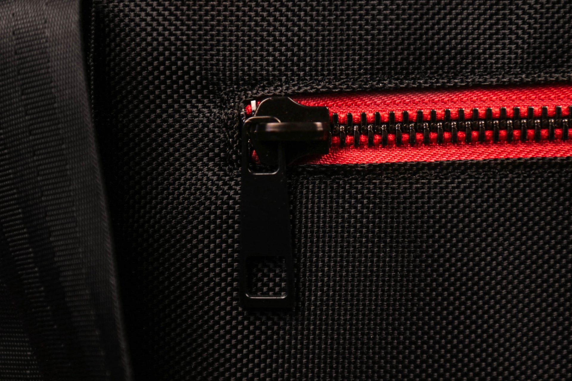 The zipper on the front pocket of the Flight Pack Sneaker Duffle Bag To Match Bred 11s | Sneaker Duffel Travel Bag