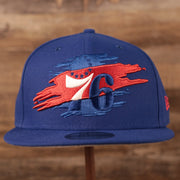 The front side of the youth royal blue grey bottom 950 snapback hat has the Philadelphia 76ers logo.