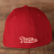 The Phillies patch at the backside of the Fightin Phils 2021 fourth of July red 39thirty flexfit hat.