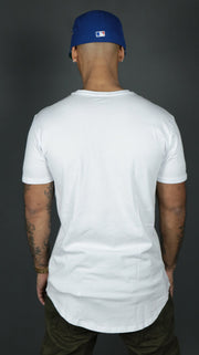 The back side of the white scoop bottom tshirt for men by Jordan Craig.