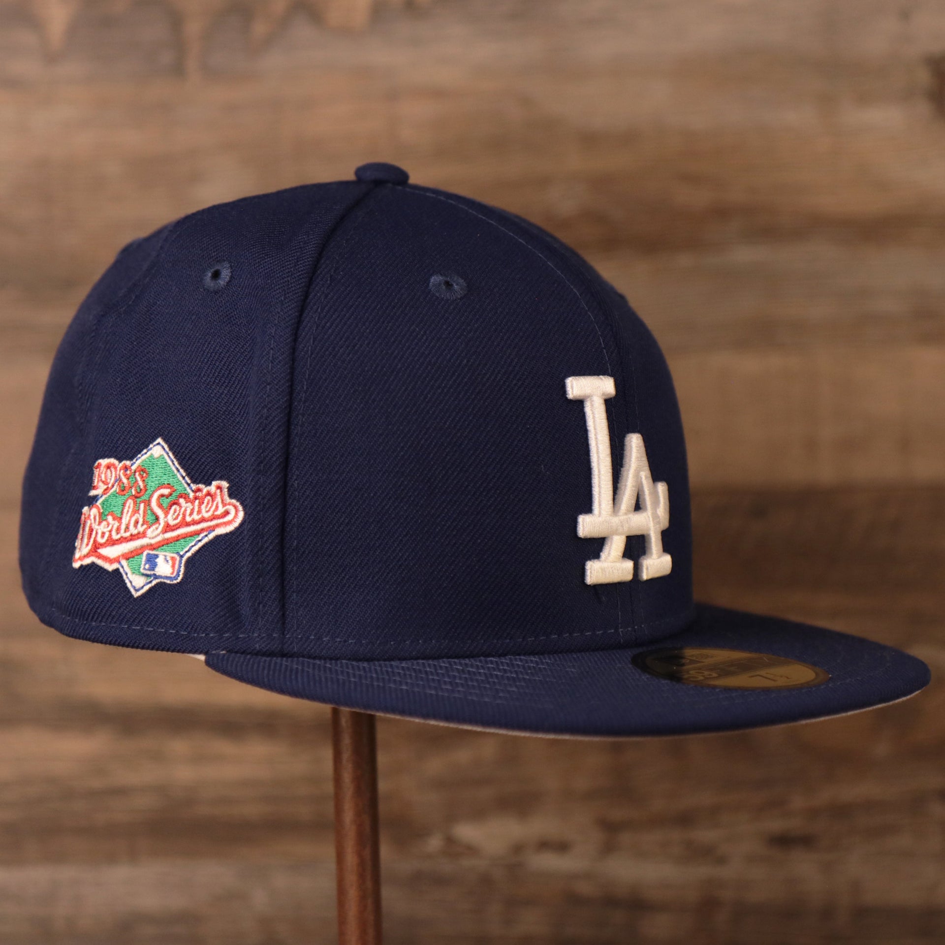 Quarter view of the LA Dodgers Grey Underbrim Fitted Cap with the 1988 World Series Side Patch