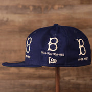 New Era blue 59fifty for the Los Angeles Dodgers with an all over logo history embroidery.