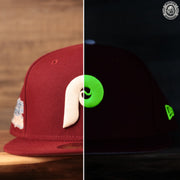 The glow in the dark Philadelphia Phillies pink under brim fitted cap by New Era.