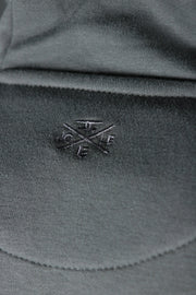 The Jordan Craig logo on the charcoal Jordan Craig basic fleece hoodie.