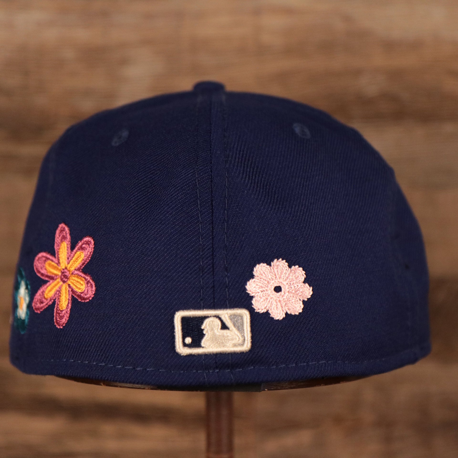 Back of the Los Angeles Dodgers All Over Floral Pattern Flower Crotchet Side Patch Pink Bottom 59Fifty Fitted Cap