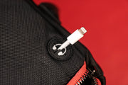 The charger port on the Flight Pack Sneaker Duffle Bag To Match Bred 11s | Sneaker Duffel Travel Bag