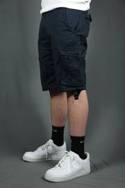 wearer's left of the Jordan Craig Bedrock Cargo Shorts Navy