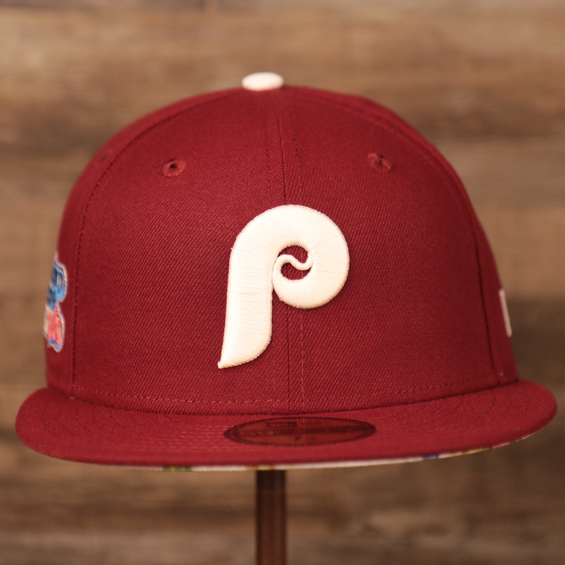The floral brim fitted retro Philadelpiha Phillies glow in the dark flower bottom 59fifty fitted hat by New Era.