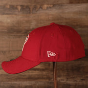 The white New Era patch on the left side of the red 2021 fourth of July 3930 flexfit hat for the Philadelphia Phillies by New Era.