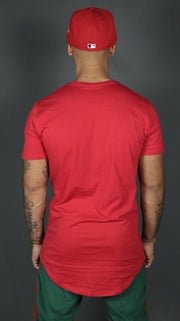 The back side of the red Jordan Craig longline mens scoop bottom tshirt.
