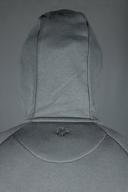 The back side of the Jordan Craig basic tech fleece hoodie.