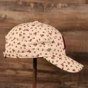 The right side of the cream Phialdelphia Phillies floral baseball hat by New Era.