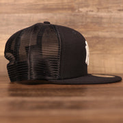 The right side of the mesh snapback hat for the New York Yankees.