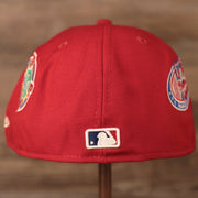 The Major League Baseball logo on the red all over Phillies patch fitted hat.