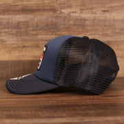 wearers left of the Ocean City New Jersey Rectangular Wave Patch | Navy Blue Trucker Hat