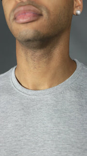 The front collar of the Jordan Craig grey men's scoop bottom tshirt.