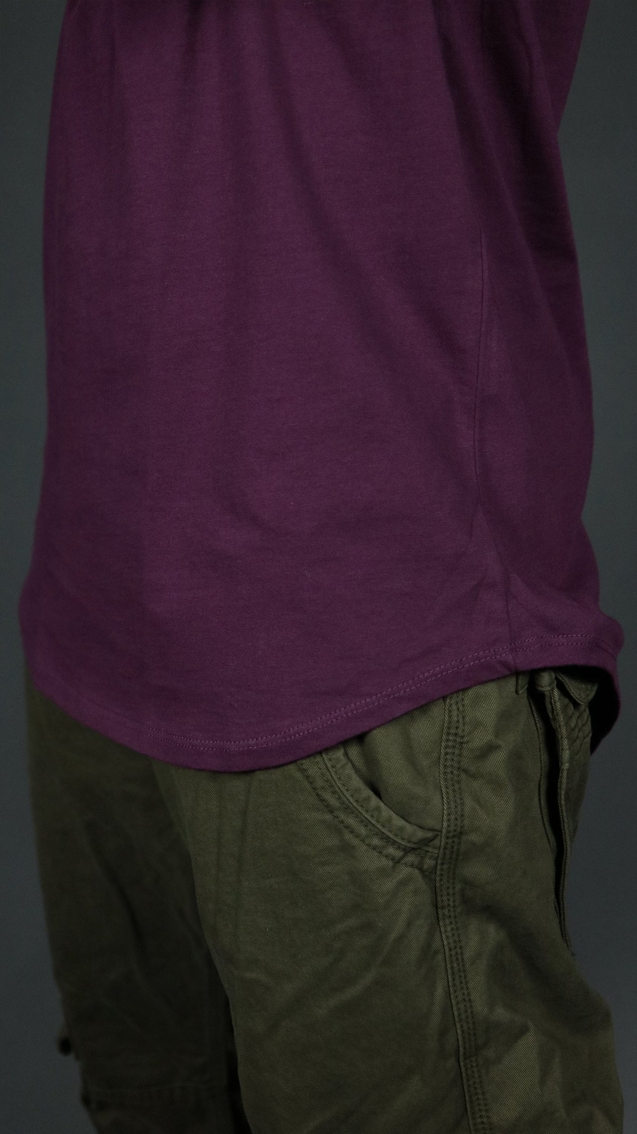 The drop cut scoop bottom of the Jordan Craig plum longline t shirt.
