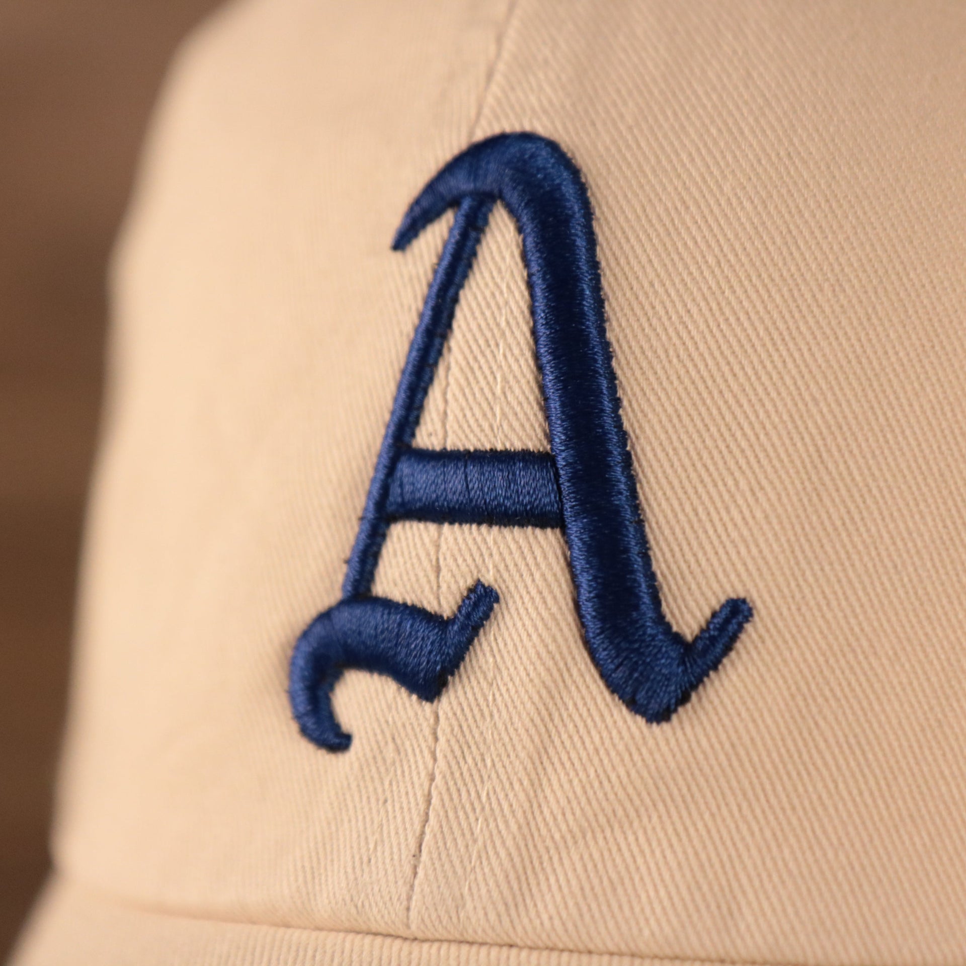 Philadelphia Athletics Royal Blue Logo Retro Cream Dad Hat Up close front view of the cap with Philadelphia Athletics logo