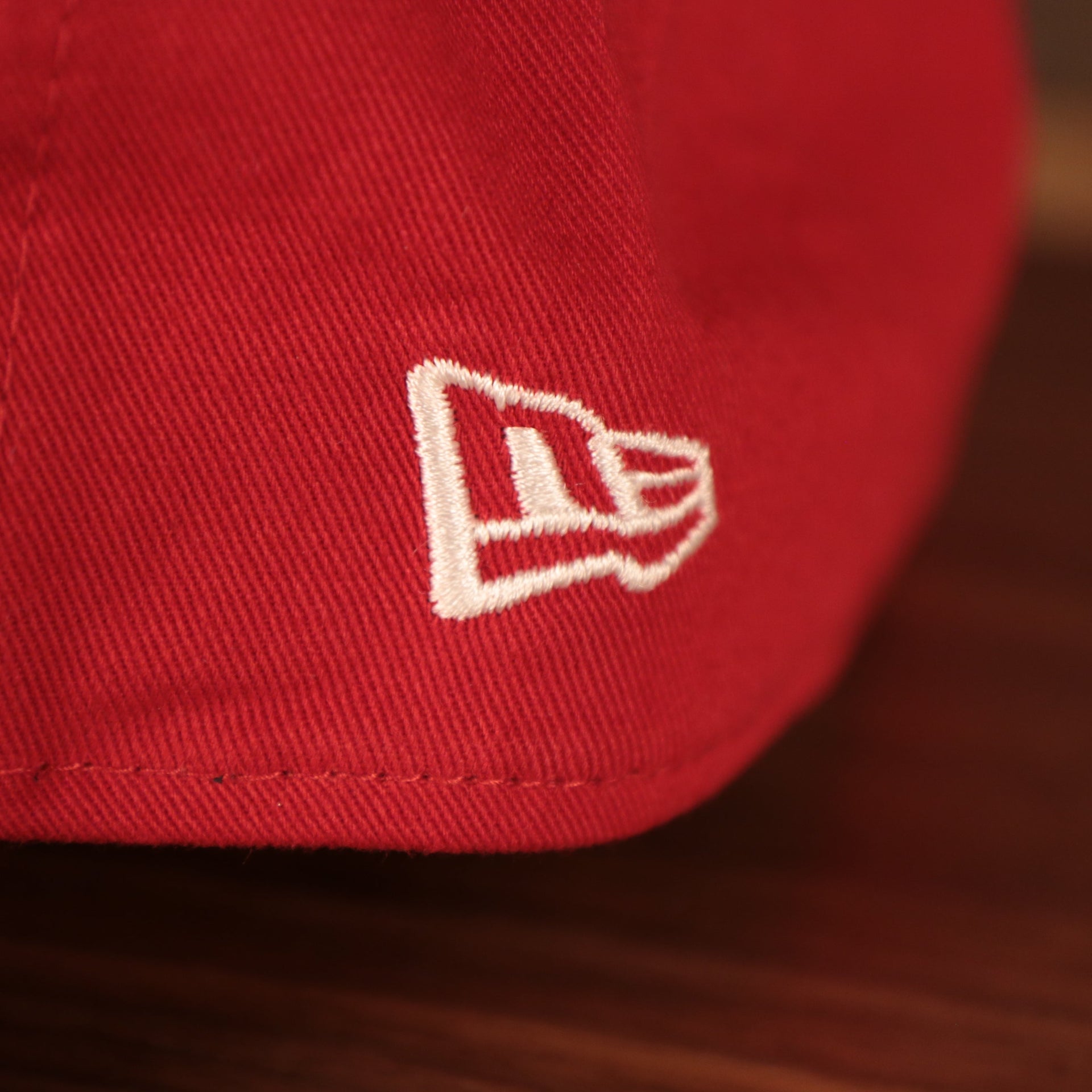 A close up shot of the New Era logo embroidered on the Jersey Shore BlueClaws 9Twenty dad hat