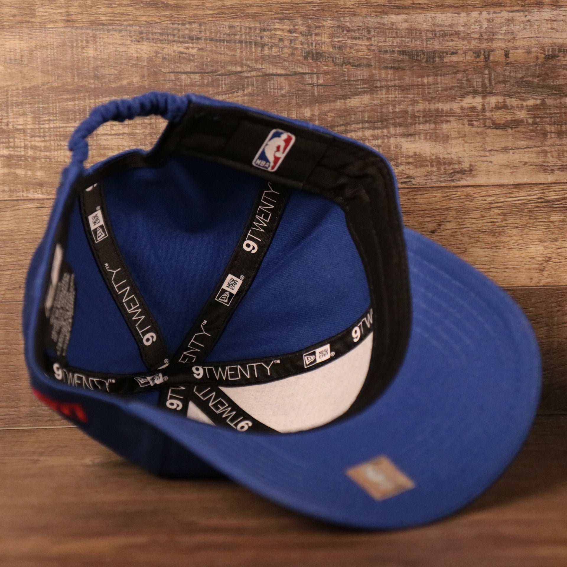 The royal blue Philadelphia 76ers toddler baseball cap by New Era.
