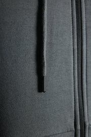 The drawstring adjustment of the charcoal basic fleece zipped hoodie by Jordan Craig.