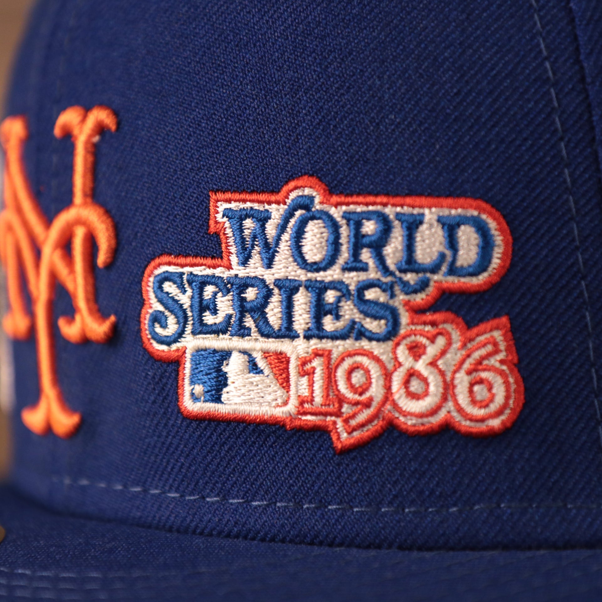 Close up of the 1986 World Series patch on the New York Mets All Over World Series Side Patch 2x Champ Gray Bottom 59Fifty Fitted Cap
