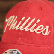 The front side Phillies patch on the washed pink New Era baseball cap for women.