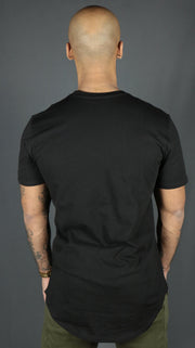 The back side of the black Jordan Craig longline T shirt mens scoop bottom tshirt.