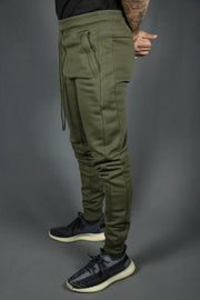 The tech fleece military green jogger pants by Jordan Craig.