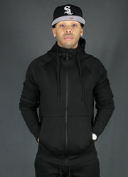 The front view of the Jordan Craig black basic tech fleece zipup hoodie.
