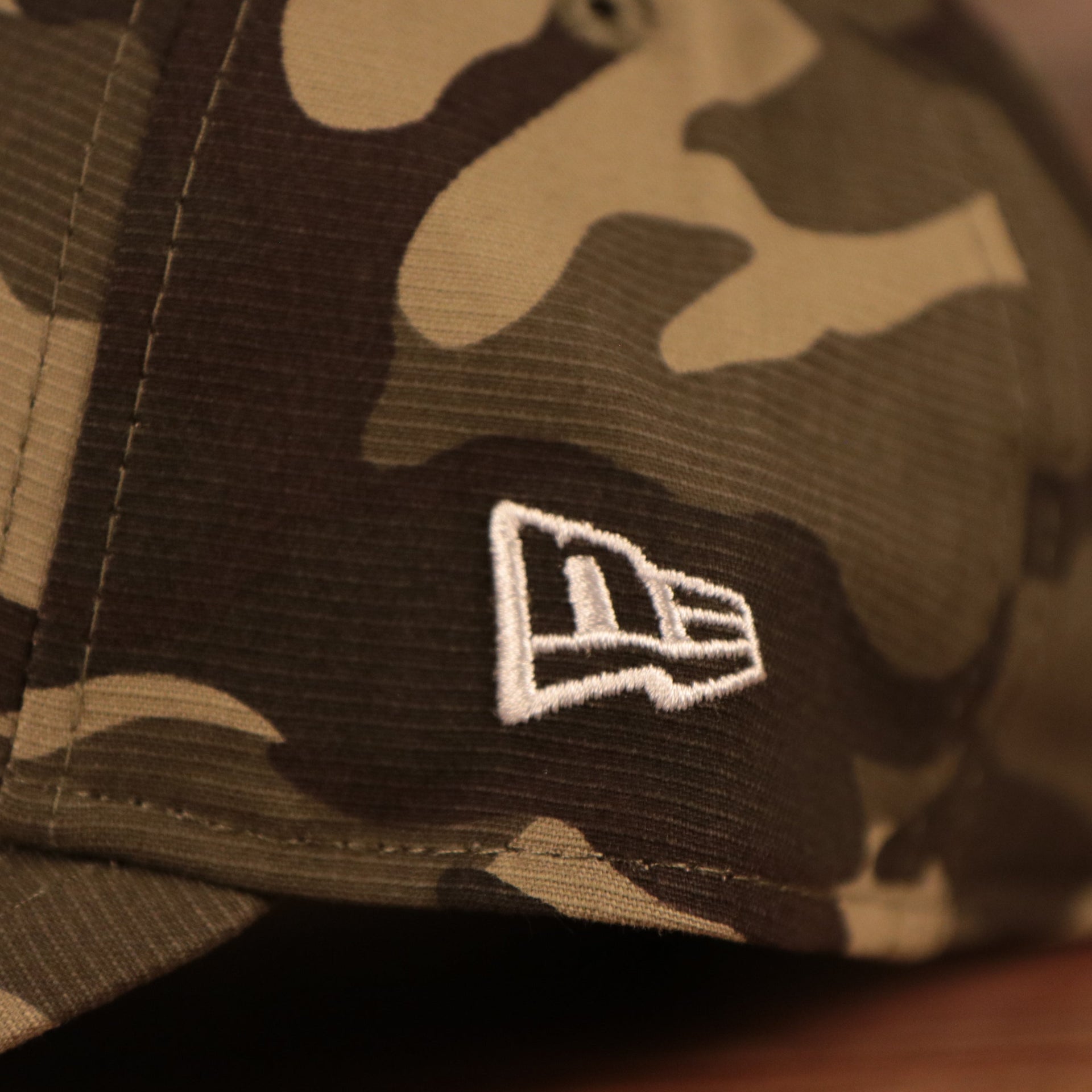 The left side of the Philadelphia Phillies woodland camo 920 dad hat for the Armed Forces Day 2021.
