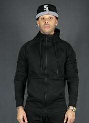 The black basic tech fleece zipup hoodie by Jordan Craig.