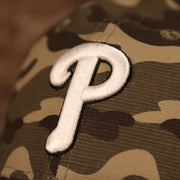 The Philadelphia Phillies white logo on the front of the Armed Forces Day 2021 9twenty dad hat.