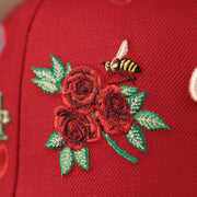 A rose design on this red all over 100 years patch fitted 59fifty hat of the Philadelphia Phillies by New Era.