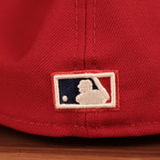 The MLB logo on the backside of the red Phillies 2008 World Series side patch fitted cap by New Era.