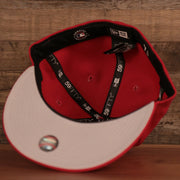 The inside of the crown of the red Philly Cheesesteak side patch New Era fitted cap.