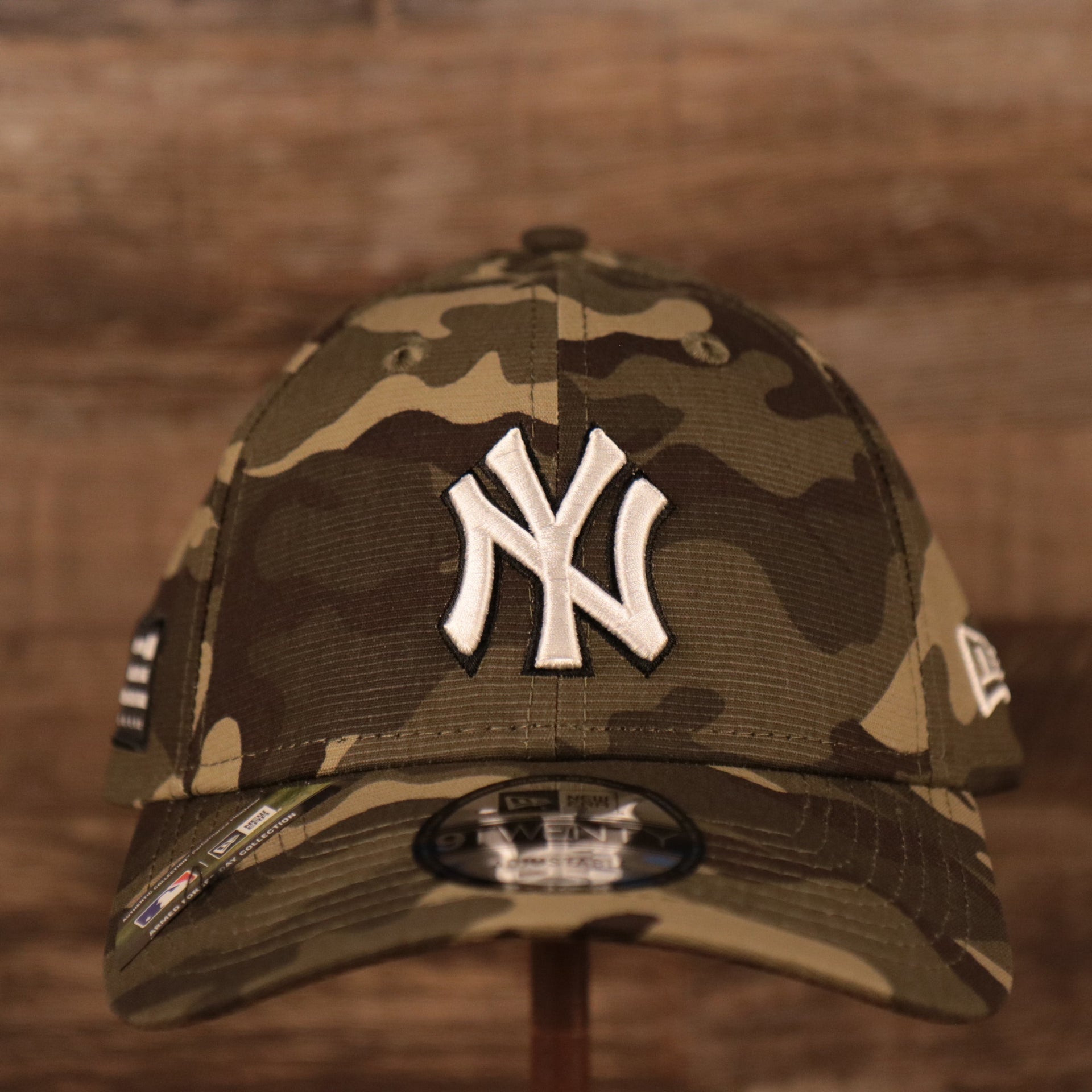 The Yankees logo patch on the front side of the Armed Forces Day on field 920 dad hat.