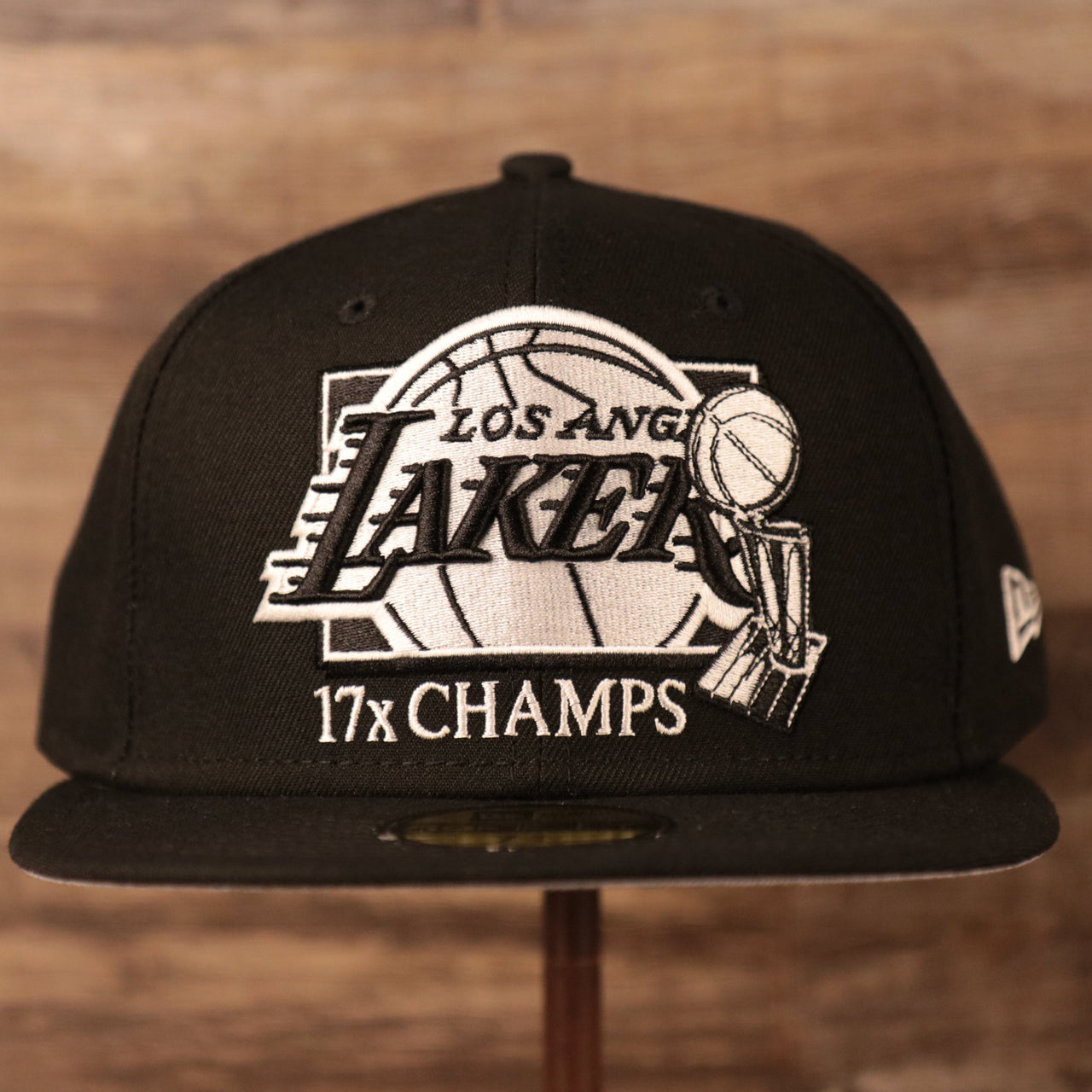 The black Los Angeles Lakers 17x champs hat with grey bottom.