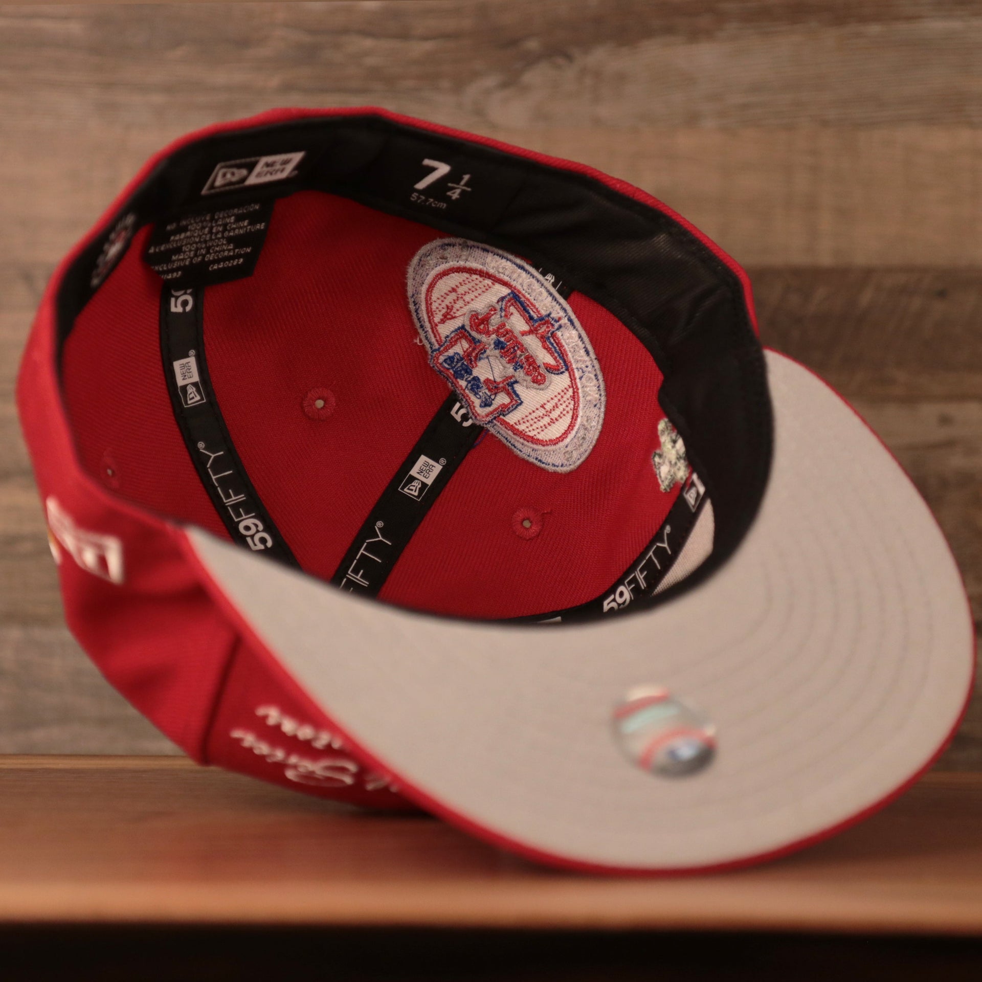 The underside of the red all over patch fitted cap by New Era for the Philadelphia Phillies.