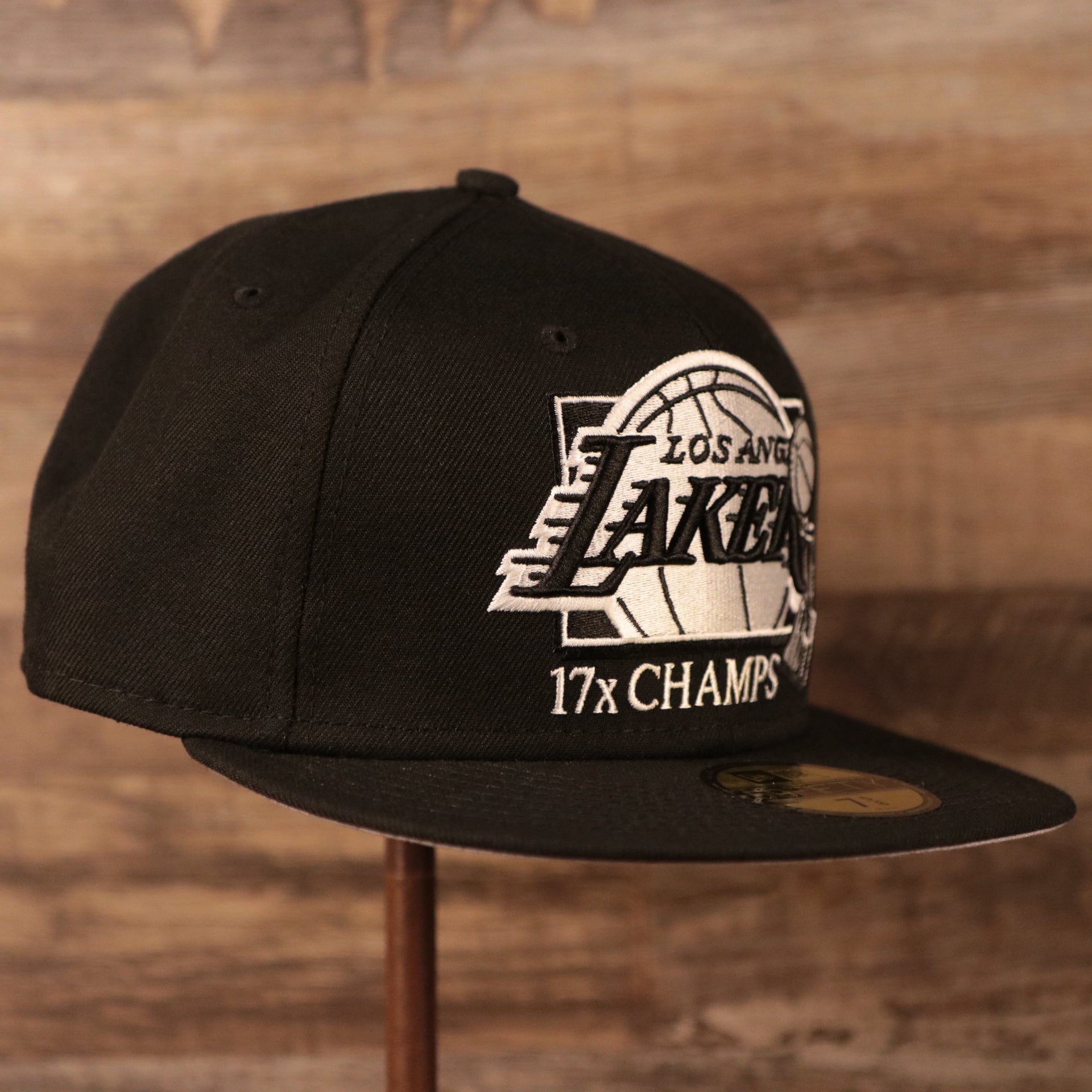 The Lakers champs 59Fifty hat with gray underbrim by New Era.