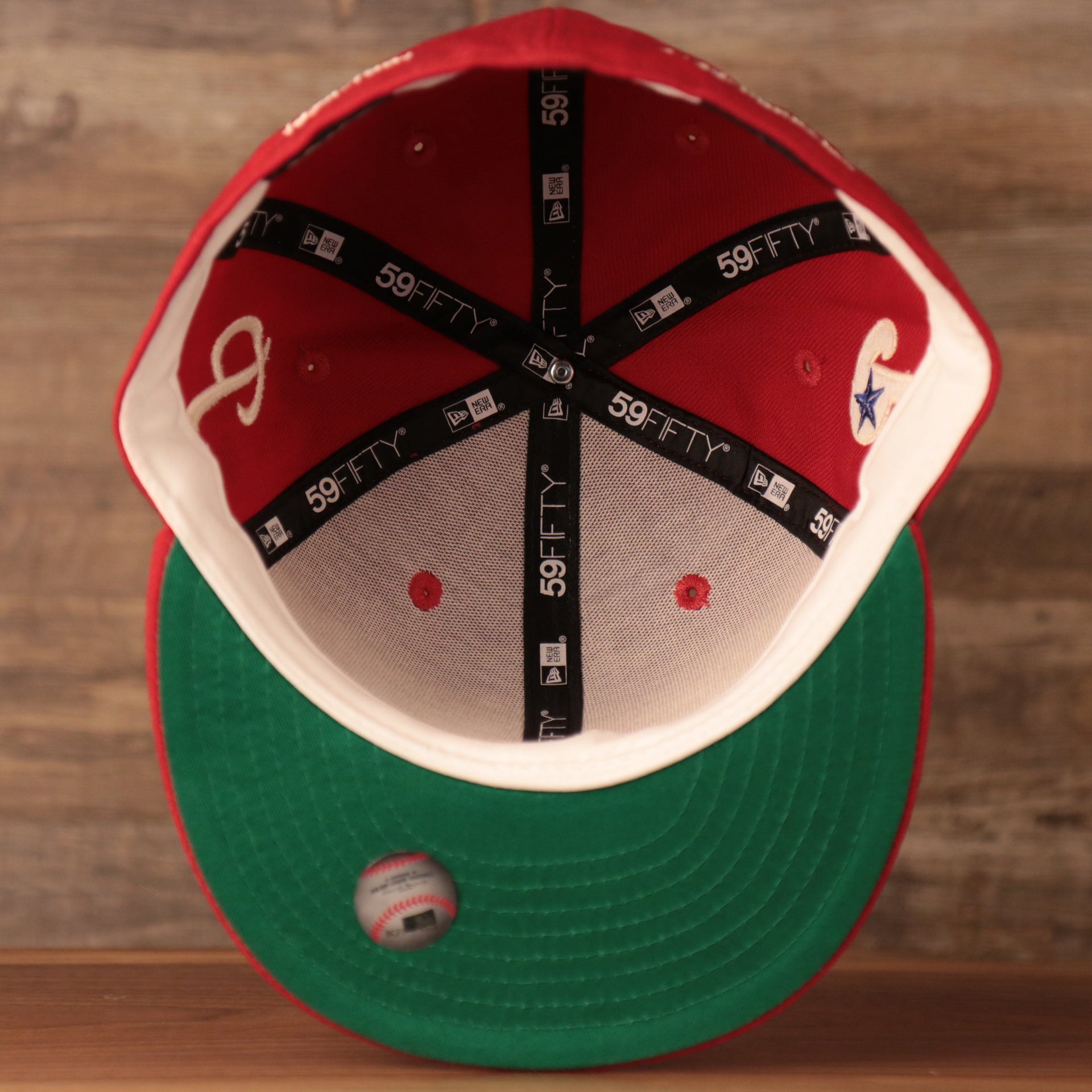 The red 59fifty has a green underbrim which adds to the funky look of this vintage 59fifty by New Era.