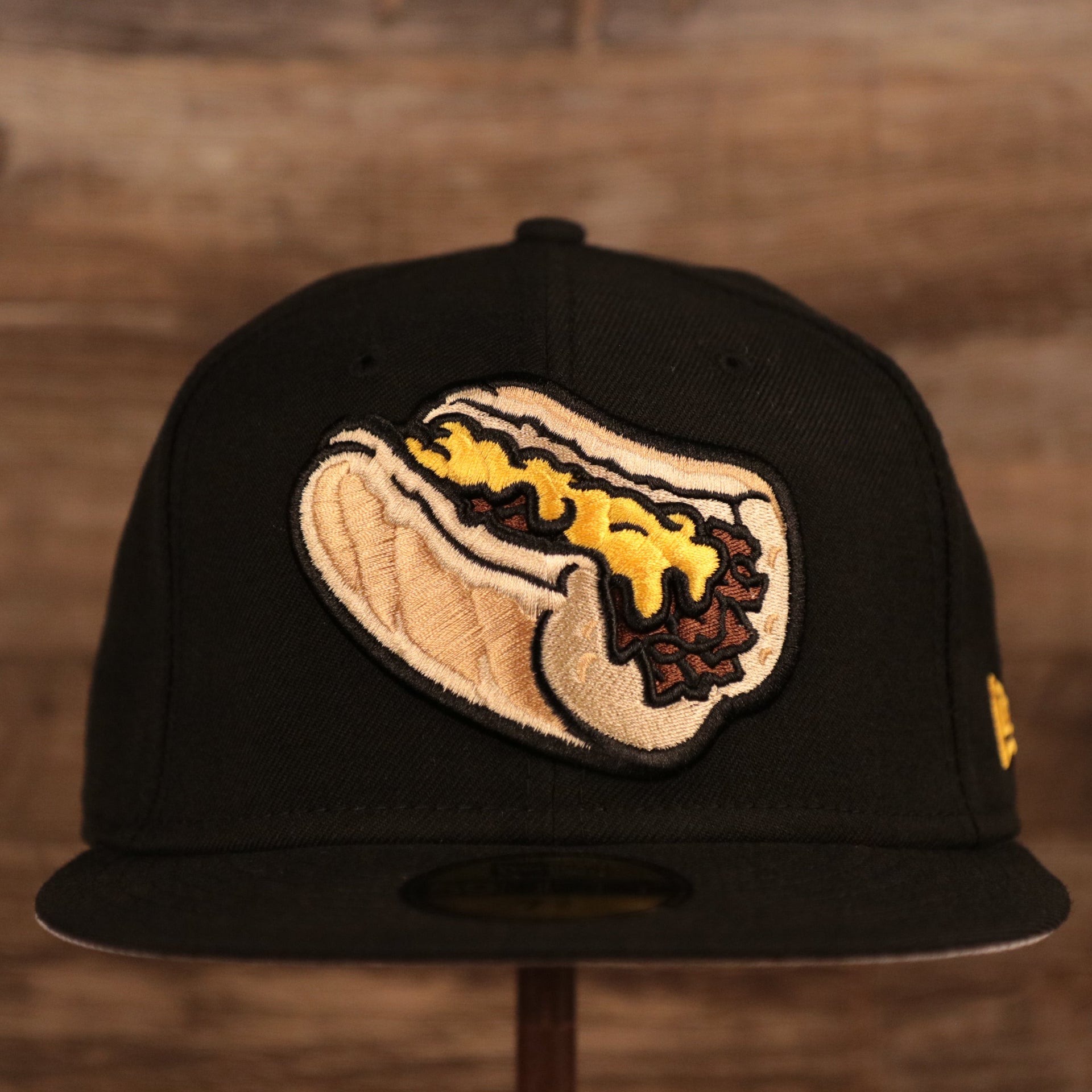 The front look of the Lehigh Valley Iron Pigs Philly cheesesteak without onions side patch fitted cap.