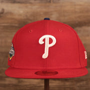 The white Phillies logo on the front of the red 2008 World Series side patch New Era fitted hat.