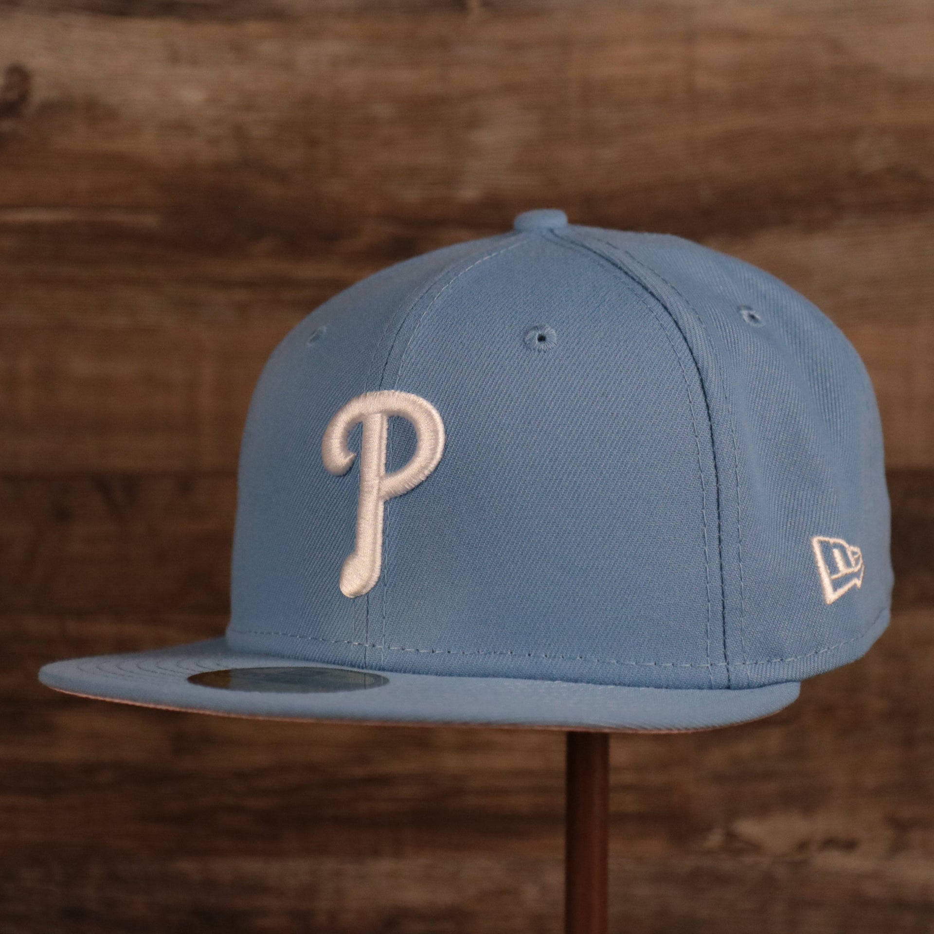 The ice blue throwback Philadelphia Phillies MLB 1996 All Star Game side patch New Era fitted cap.